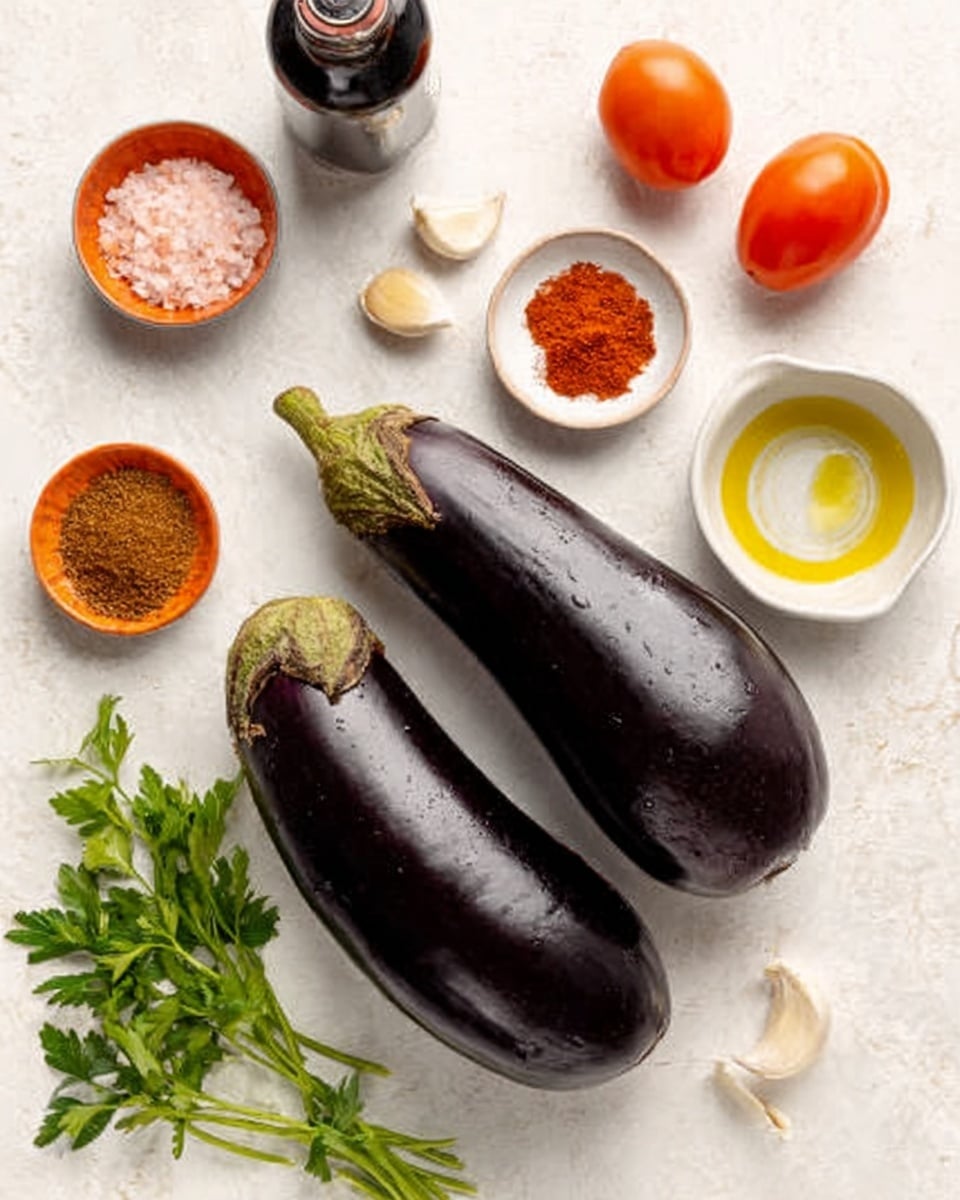 The image shows two whole dark purple eggplants placed in the center on a white marbled surface. Around them are small bowls and ingredients arranged neatly: a white bowl with coarse salt above, a white bowl with light green olive oil to the right, and orange bowls with brown spice powder and a bright red spice powder at the bottom and left sides. Fresh green leaves of parsley are at the bottom left, with two garlic cloves and a bulb near the bottom center. Some orange cherry tomatoes and a dark bottle are in the top left corner. The colors contrast nicely with the white marbled background. photo taken with an iphone --ar 4:5 --v 7