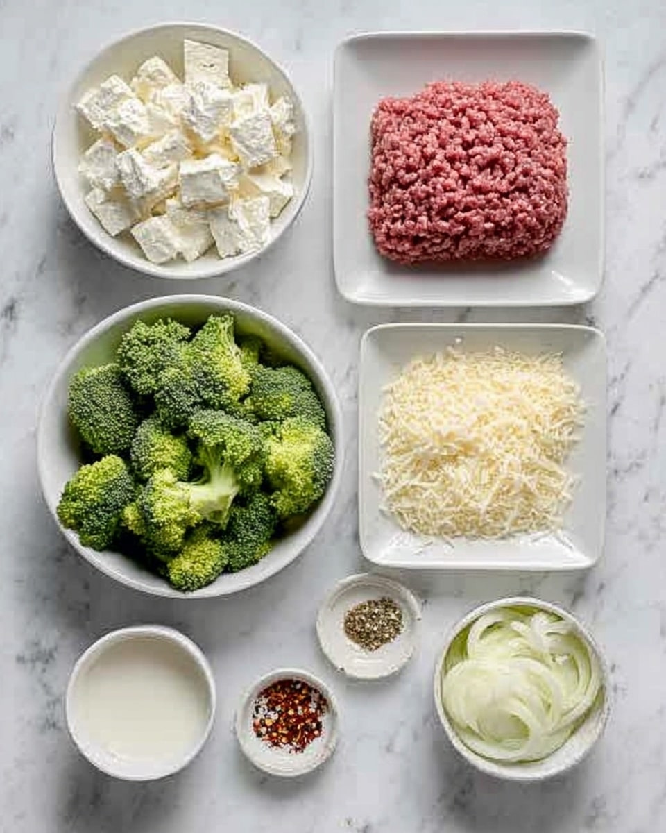 The image shows a white marbled surface with eight separate containers arranged neatly. At the top left, there is a white bowl filled with soft white cheese, while next to it is a white plate holding raw ground beef. To the right, a white square container is full of fresh broccoli florets. Below these, there is a small white bowl with grated parmesan cheese, a white bowl with shredded mozzarella cheese, and a small white container holding chopped onions and milk. Between these is a small white dish with ground black pepper and red pepper flakes. The overall arrangement is neat and clean, showing each ingredient clearly. Photo taken with an iphone --ar 4:5 --v 7