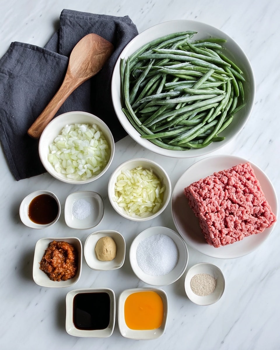 The image shows several white bowls and small dishes arranged neatly on a white marbled surface. The largest bowl at the top right holds a square block of raw ground meat with a pinkish-red color and a soft texture. To the left, there is a large white bowl filled with frozen green beans, clustered together with visible frost on them. Below the ground meat bowl, a medium white bowl contains chopped white onions, layered loosely. Near it, a small white bowl has finely minced light yellow ginger. Another small bowl next to it holds a reddish-brown paste that looks sticky. Below these, there is a small round white bowl with a white powder, likely salt, beside another tiny white bowl with tiny white granules. To the left, three small dishes hold different sauces or liquids: one is dark brown almost black, another is bright orange-yellow, and the third is dark brown but thicker. Two very small square dishes at the bottom left hold fine powders, light brown and beige. A wooden spatula rests diagonally on the top left corner over a folded dark gray cloth. photo taken with an iphone --ar 4:5 --v 7