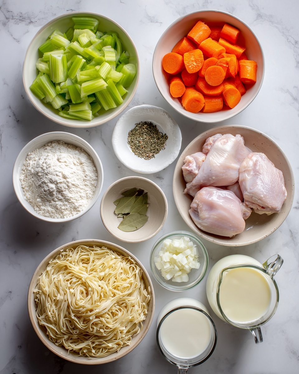 The image shows several ingredients placed on a white marbled surface with white bowls and clear glass pitchers. There are seven visible containers with food: a bowl filled with bright green sliced celery at the top center, a bowl with orange carrot slices to the right, and below it, a bowl holding two raw pale pink chicken pieces. To the left of the celery, there is a bowl of white flour and a beige bowl full of finely chopped white onion. At the bottom left is a bowl filled with uncooked pale yellow egg noodles, and near the bottom right are two clear pitchers, one with white milk and the other with light golden chicken broth. A small white dish above the carrots has dried herbs, whole bay leaves, salt, and pepper. A small white bowl to the bottom right contains minced garlic photo taken with an iphone --ar 4:5 --v 7