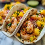 Grilled Shrimp Tacos with Lime Crema and Cabbage Slaw Recipe