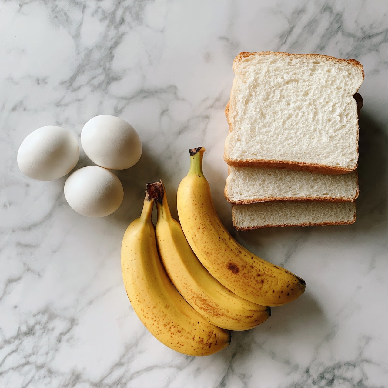square image Three white eggs lie on a white marbled surface next to two yellow bananas with brown spots. To the right of the bananas, three slices of white bread with soft texture are stacked slightly overlapping each other, all placed on the white marbled surface. The light is soft, and everything is arranged neatly in a row. photo taken with an iphone --ar 4:5 --v 7
