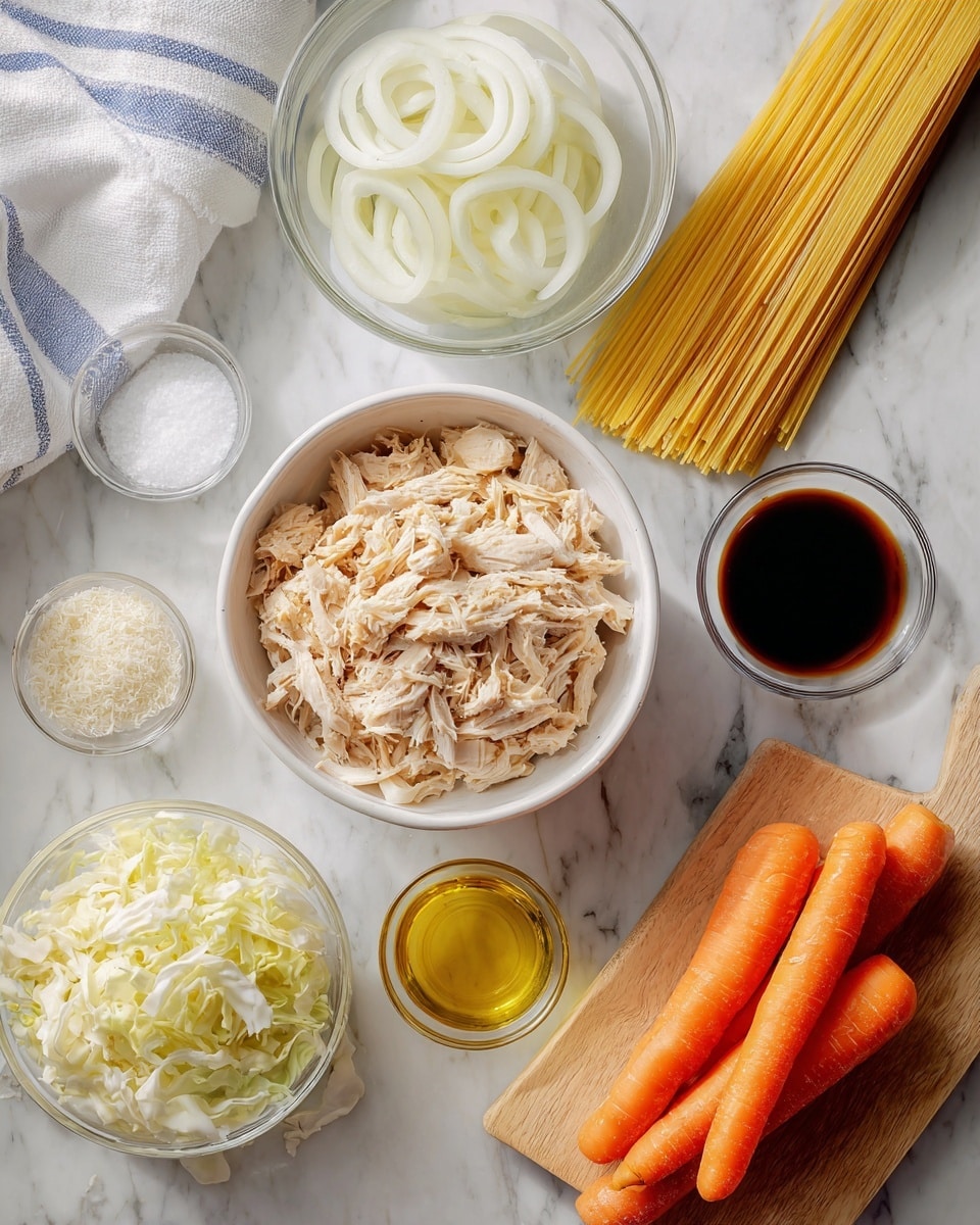 The image shows an arrangement of raw cooking ingredients on a white marbled surface. In the center, there is a white bowl filled with chopped light brown cooked chicken. Around it, starting from the top middle and moving clockwise, there is a small glass bowl with thin white onion slices, a bundle of uncooked yellow spaghetti, another clear bowl filled with pale yellow shredded cabbage, a small glass cup of dark soy sauce, a clear container holding white granulated salt, a small glass container with a clear liquid (likely vinegar or water), a tablespoon with golden olive oil, and three whole bright orange carrots placed diagonally on a wooden cutting board. A white cloth with blue stripes is partially visible in the top left corner. The photo taken with an iphone --ar 4:5 --v 7
