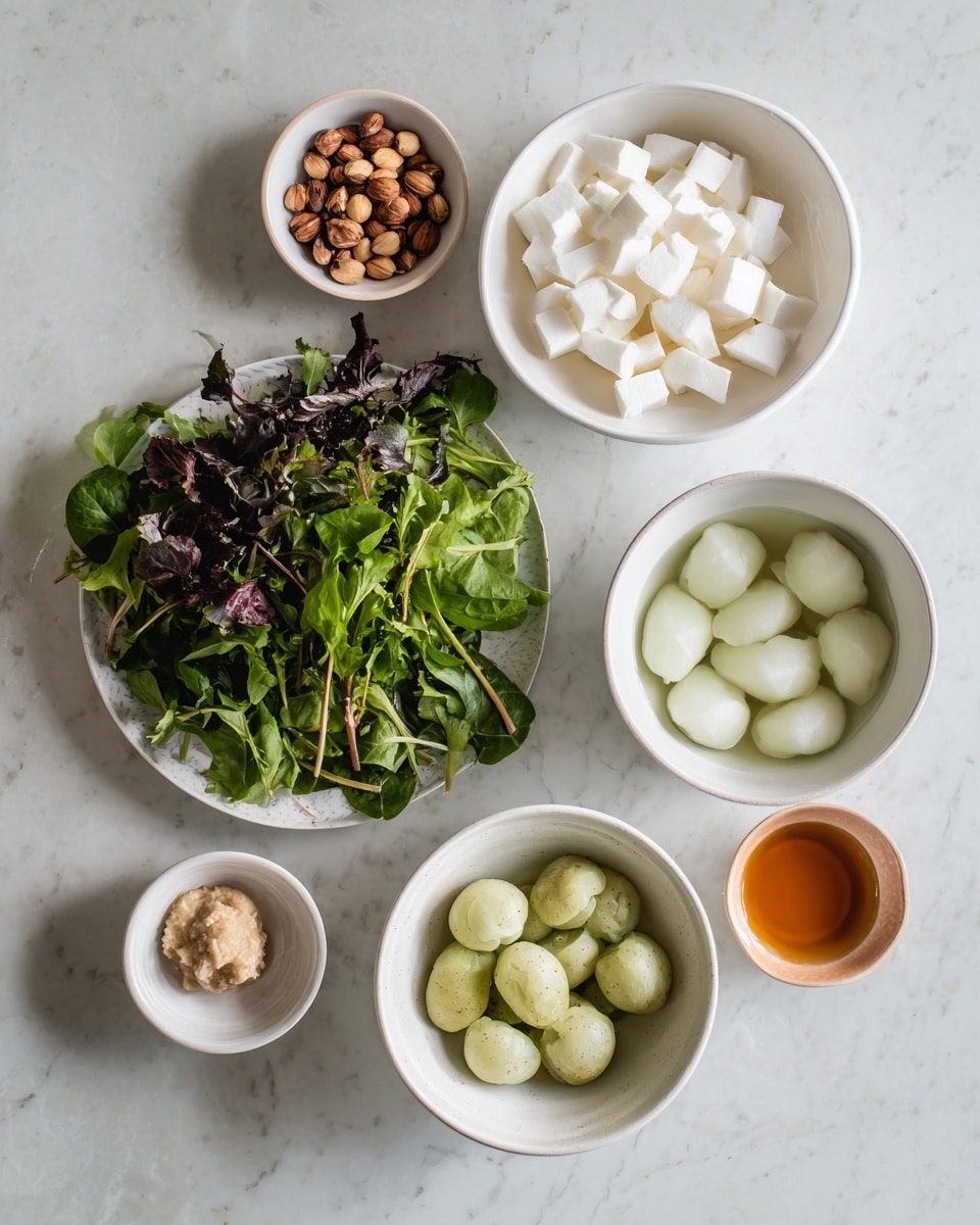 The image shows six white bowls and plates arranged on a white marbled surface. On the top right, there is a large bowl filled with small white cubes soaking in water. Below it, a medium bowl contains small calabash-shaped light green pieces soaking in water. To the left of these, a large plate holds a mix of fresh green and purple leafy vegetables with some stems. Above this plate is a small white bowl with light brown round nuts or seeds. To its right, a small bowl contains a dark amber liquid, possibly honey or syrup. Lastly, another small bowl near the large leafy plate has a pale brown paste inside. The overall look is fresh and organized. photo taken with an iphone --ar 4:5 --v 7