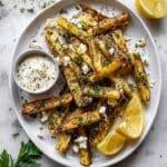 Greek Fries with Feta, Herbs, Lemon, and Tzatziki Recipe