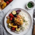 Greek Sheet Pan Chicken Dinner with Roasted Potatoes, Vegetables, and Feta Recipe