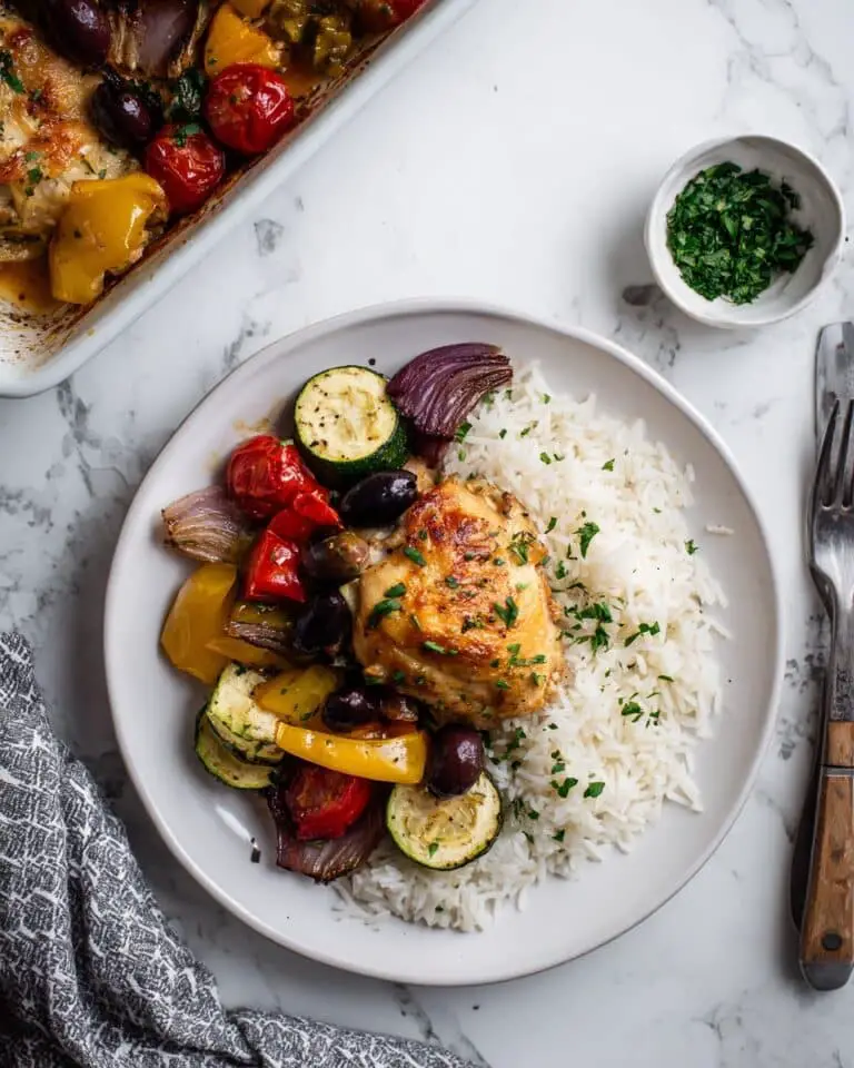 Greek Sheet Pan Chicken Dinner with Roasted Potatoes, Vegetables, and Feta Recipe