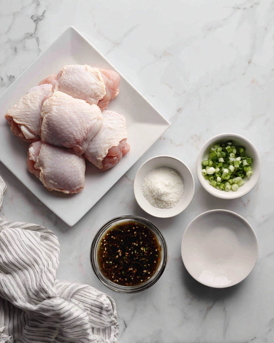 The image shows four raw pink chicken pieces placed on a white square plate at the top left. To the right of the plate, there is a small white bowl filled with chopped green onions, below it is another small white bowl holding a white powdery ingredient, and below that is a small empty round white dish. In the bottom center, there is a clear glass bowl with a dark, thick sauce that has visible seeds and small bits of ingredients. A white and gray striped cloth lies on the bottom left corner, all set on a white marbled surface. Photo taken with an iphone --ar 4:5 --v 7