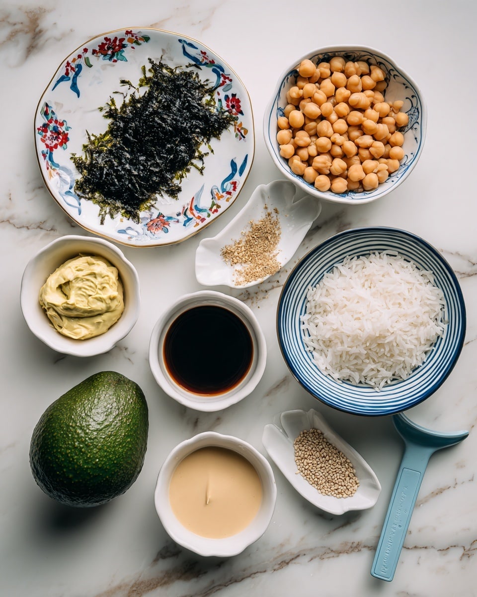 The image shows various ingredients laid out neatly on a white marbled surface. On the top right, there is a white bowl with blue stripes filled with white rice. To its left, a small bowl holds light brown chickpeas. Below, two bowls with the same blue striped pattern contain one dark brown sauce and one light cream-colored sauce. On the left side, a large whole avocado sits next to a small white dish shaped like a fish holding a dollop of mayonnaise. Above that, a white plate with blue and red floral patterns has a sheet of dark seaweed and crushed seaweed flakes sprinkled with sesame seeds. A light blue measuring spoon is placed near the bottom right. The arrangement is clean and organized, presenting the elements clearly. photo taken with an iphone --ar 4:5 --v 7