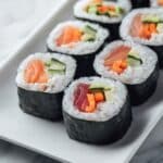Homemade Salmon and Tuna Sushi Rolls with Fresh Vegetables Recipe