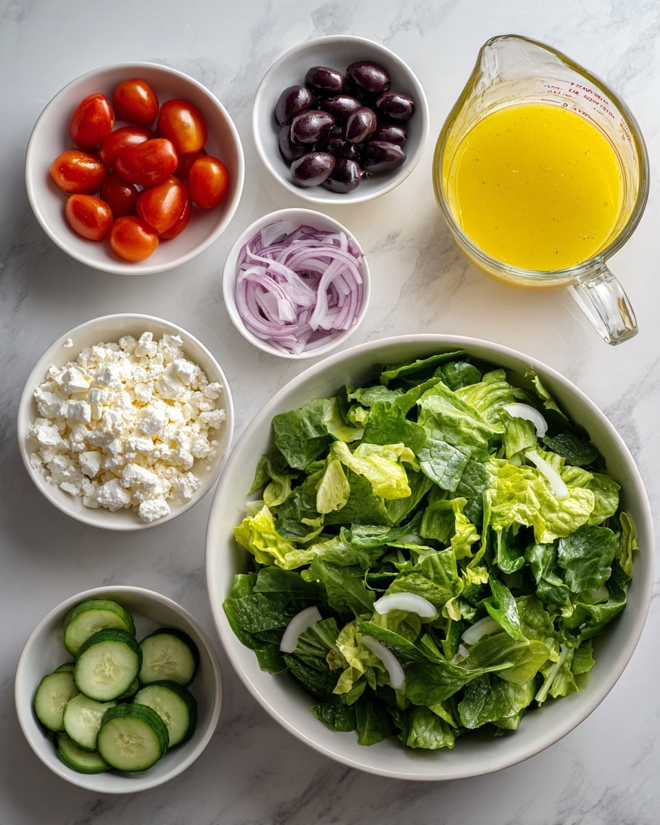 The image shows a white marbled surface with a large white bowl filled with mixed green salad leaves in the lower right. Around the bowl, there are six small white bowls containing different salad ingredients: cherry tomatoes in the top left bowl, thinly sliced red onions in the middle left bowl, crumbled white cheese in the bottom left bowl, black olives in the bottom middle left bowl, and cucumber chunks in the middle right bowl. At the top right, there is a clear glass measuring cup filled with yellow salad dressing. The scene is bright and fresh, with all ingredients neatly arranged. photo taken with an iphone --ar 4:5 --v 7