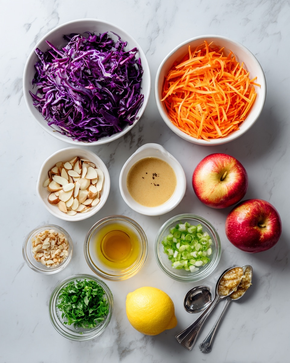 The image shows different ingredients laid out on a white marbled surface, ready for making a dish. There is one large white bowl filled with dark purple shredded cabbage placed in the top left, and to the right of it is a medium white bowl with bright orange shredded carrots. Two whole red apples with hints of yellow are placed near the center. Below, there are several small white bowls and glass containers holding various ingredients: chopped green onions, sliced almonds, a creamy tan sauce, honey, olive oil, salt and pepper mixed, fresh green herbs, a whole lemon, and two spoons holding minced garlic and whole grain mustard. The colors are vibrant and contrast well against the white marbled background. Photo taken with an iphone --ar 4:5 --v 7